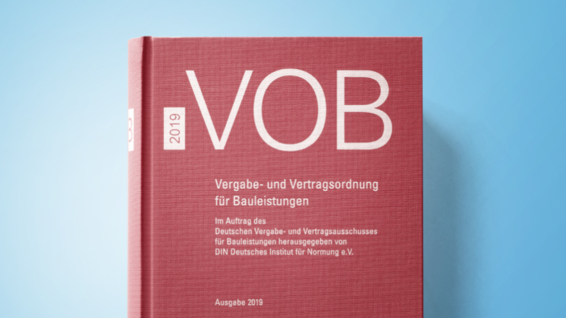 VOB Buch Ausgabe 2019 auf blauen Hintergrund