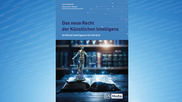 Buchcover: "Das neue Recht der Künstlichen Intelligenz" mit Justitia-Statue.